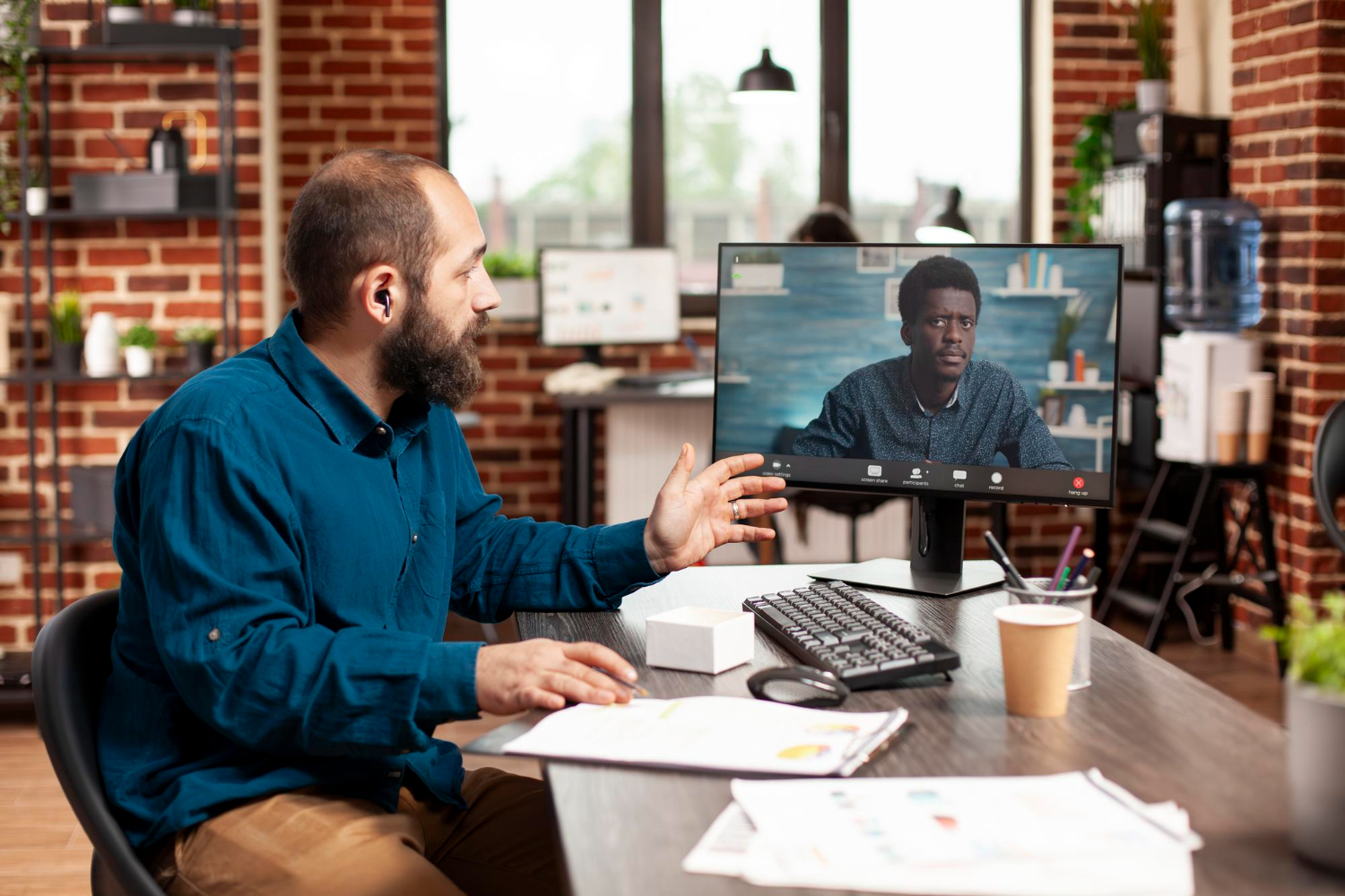 A diverse team collaborating online securely.